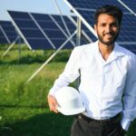 male-arab-engineer-standing-on-field-with-rows-of-2023-11-28-23-11-44-utc (1)
